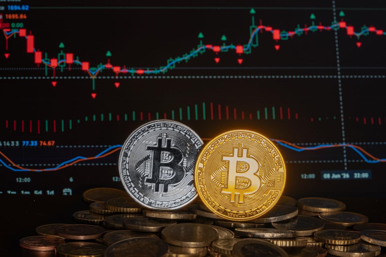 Bitcoin Against Financial Graph on Screen