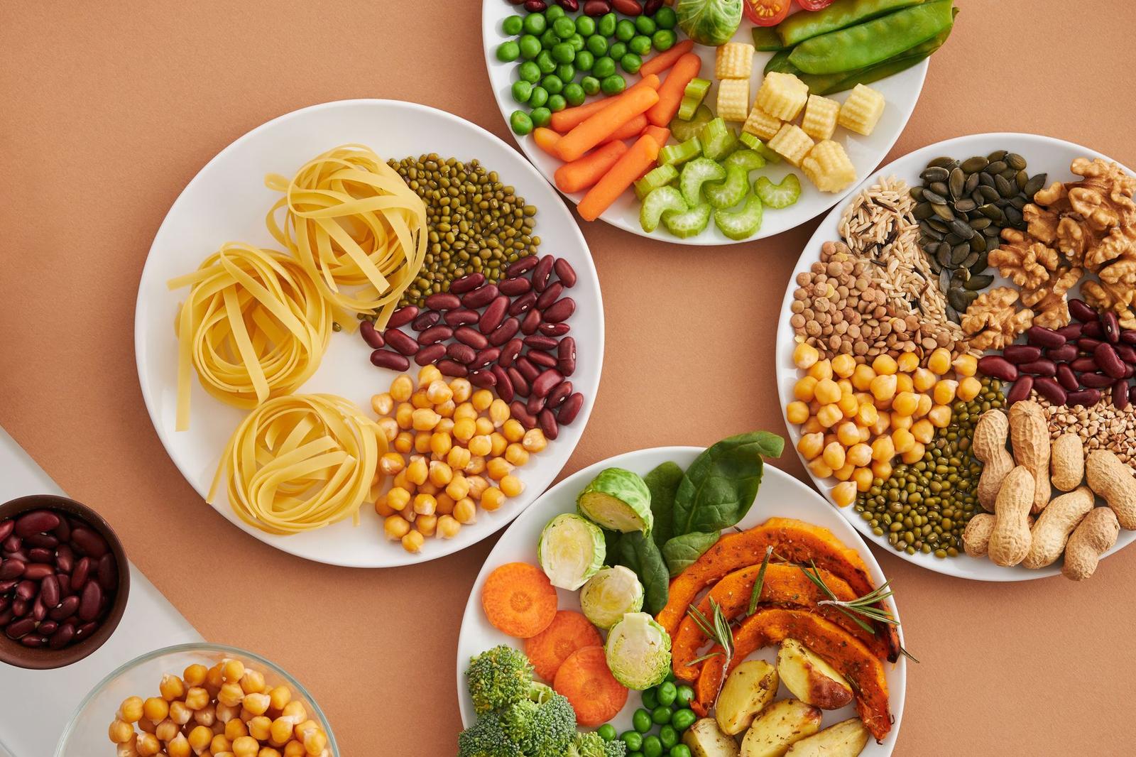 Vegetables Seeds and Nuts on Plates on Table