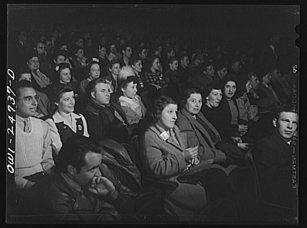 Audience at late moving picture show which starts 8d17351v