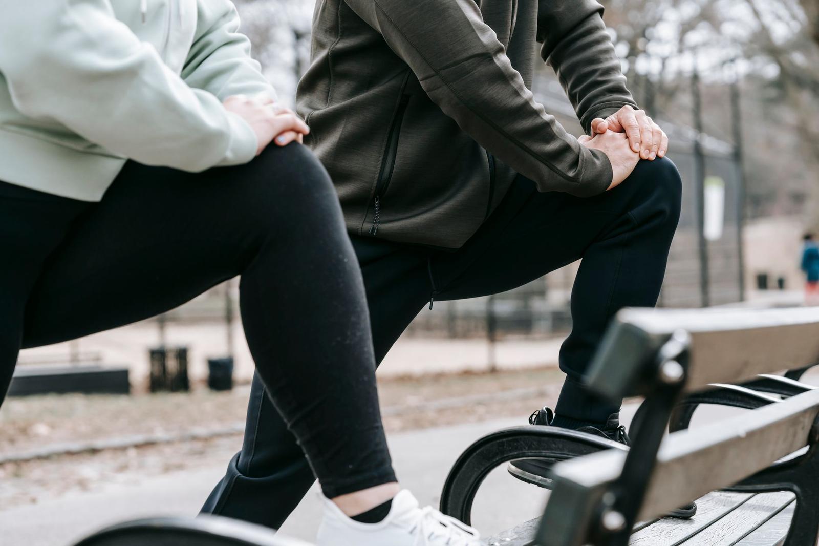 Sportive People Training on Street in Park